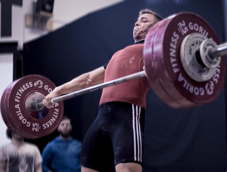 Olympic weightlifter doing a snatch