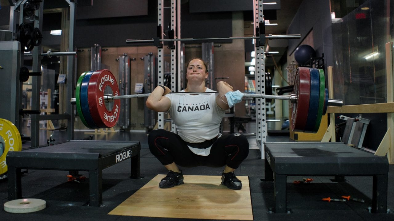 Female Olympic Weightlifter Clean